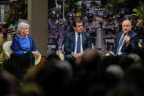 epa12585148 (L-R) Olivia Stokes Dreier, Alfredo Romero and Staffan I. Lindberg during the Nobel Peace Prize peace forum in the University's auditorium in Oslo, Norway, 11 December 2025. She received the Nobel Peace Prize 2025 for her tireless work promoting democratic rights for the people of Venezuela and for her struggle to achieve a just and peaceful...