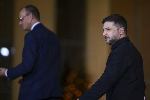epa12594554 German Chancellor Friedrich Merz (L) and Ukrainian President Volodymyr Zelensky (R) depart after a press conference at the Chancellery in Berlin, Germany, 15 December 2025. Berlin hosts US and Ukrainian delegations for talks on a proposed peace plan, including a possible ceasefire in Ukraine.  EPA/CLEMENS BILAN