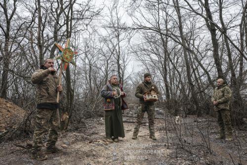epa12612278 A handout photo made available by the press service of the 33rd Separate Mechanized Brigade of Ukrainian Armed Forces shows servicemen of the 33rd Separate Mechanized Brigade celebrating Christmas at their position on a frontline in Donetsk region, Ukraine, 25 December 2025, amid the ongoing Russian invasion. Ukraine celebrates Christmas on 25...