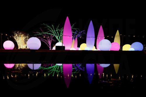 epa12612705 A view of the Orchestral Orbs area at the Atlanta Botanical Garden's 'Garden Lights, Holiday Nights' display in Atlanta, Georgia, USA, 25 December 2025 (Issued 26 December 2025). The popular holiday light display, in its 15th year, runs through 11 January 2026.  EPA/ERIK S. LESSER