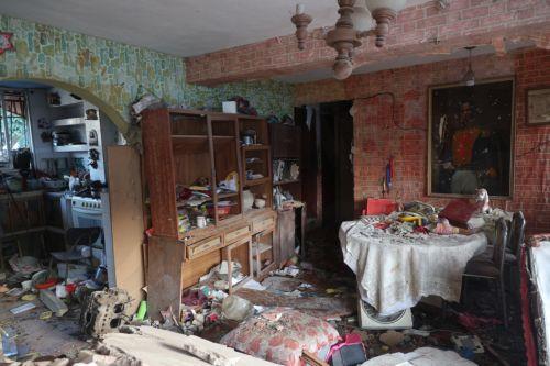 epa12627776 A view of the interior of a building damaged by an explosive device in Catia La Mar, Venezuela, 04 January 2026.  EPA/MIGUEL GUTIÉRREZ