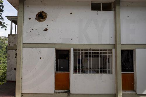 epa12632540 A house damaged after a US attack in Caracas, Venezuela, 06 January 2026. Broken glass, bullet holes, dust, and paint remnants cover furniture and floors in several homes in a Caracas neighborhood affected by the US attack last 03 January, which culminated in the capture of President Nicolas Maduro and his wife, Cilia Flores.  EPA/MIGUEL...