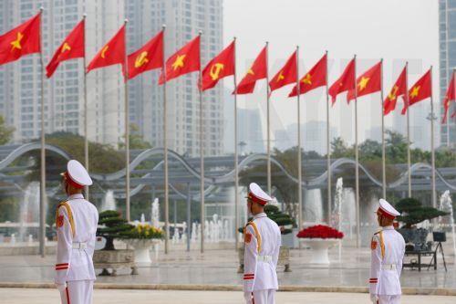 epa12660369 Members of the honor guard stand at the National Convention Center, the venue for the 14th National Congress of the Communist Party of Vietnam, in Hanoi, Vietnam, 19 January 2026. The preparatory session of the 14th National Party Congress is held on 19 January 2025, while the Congress will take place from 19-25 January 2026.  EPA/LUONG THAI LINH