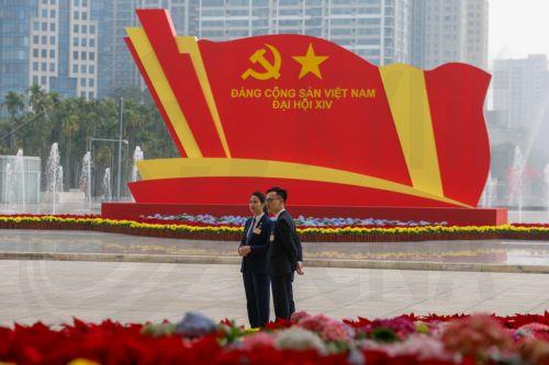 epa12660382 Vietnamese security officers stand at the National Convention Center, the venue for the 14th National Congress of the Communist Party of Vietnam, in Hanoi, Vietnam, 19 January 2026. The preparatory session of the 14th National Party Congress is held on 19 January 2025, while the Congress will take place from 19-25 January 2026.  EPA/LUONG THAI...