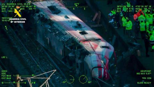 epa12660953 A screen grab from a video made available by the Spanish Civil Guard shows agents gathering evidence at the site of the wreckage where, on 18 January 2026, at least 39 people died after a high-speed train carrying more than 300 passengers derailed and collided with another train traveling in the opposite direction on an adjacent track near the...
