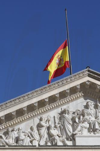 epa12661049 The Spanish flag flies at half-mast at the Lower House in Madrid, Spain, 19 January 2026, in memory of the victims of the train accident on 18 January 2026, in which at least 39 people died after a high-speed train carrying more than 300 passengers derailed and collided with another train traveling in the opposite direction on an adjacent track...