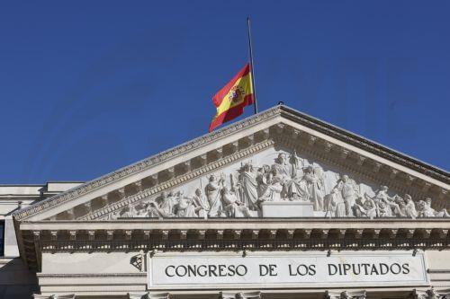 epa12661050 The Spanish flag flies at half-mast at the Lower House in Madrid, Spain, 19 January 2026, in memory of the victims of the train accident on 18 January 2026, in which at least 39 people died after a high-speed train carrying more than 300 passengers derailed and collided with another train traveling in the opposite direction on an adjacent track...