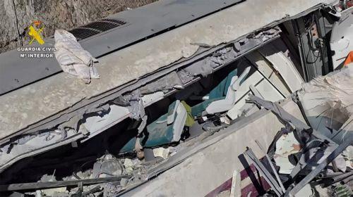 epa12661342 A screen grab from a video made available by the Spanish Civil Guard shows agents gathering evidence at the site of the wreckage where, on 18 January 2026, at least 39 people died after a high-speed train carrying more than 300 passengers derailed and collided with another train traveling in the opposite direction on an adjacent track near the...