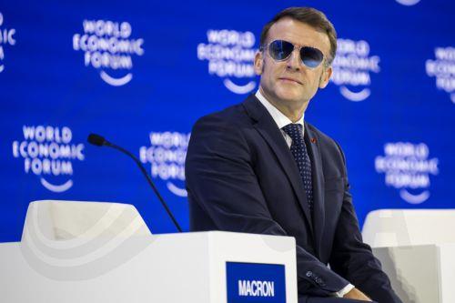 epa12664313 French President Emmanuel Macron attends a plenary session at the Congress Hall during the 56th annual meeting of the World Economic Forum (WEF) in Davos, Switzerland, 20 January 2026. The meeting, held under the theme 'A Spirit of Dialogue,' brings together entrepreneurs, scientists, and corporate and political leaders and runs from 19 to 23...