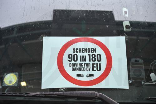 epa12682812 A protest sign on a windscreen of a truck at the Serbia-Hungary border during the blockade of the cargo line at the Horgos border crossing in northern Serbia, 26 January 2026. All border crossings in the country and the wider region are blocked to freight traffic starting 26 January at noon, following a coordinated protest by truck operators...