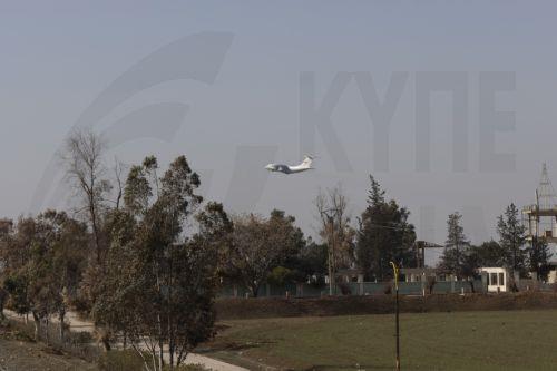 epa12685026 A plane over to Al-Qamishli airbase, northeast Syria, 27 January 2026. According to the Britain-based war monitor Syrian Observatory for Human Rights (SOHR) the Russian forces started to partially transport military and logistical equipment from their positions in Al-Qamishli to the military airbase in Latakia countryside.  EPA/AHMED MARDINLI