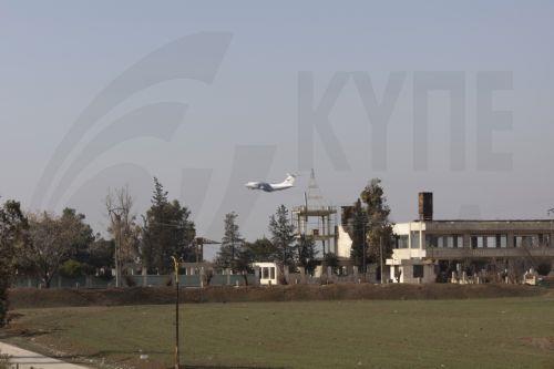 epa12685028 A plane over to Al-Qamishli airbase, northeast Syria, 27 January 2026. According to the Britain-based war monitor Syrian Observatory for Human Rights (SOHR) the Russian forces started to partially transport military and logistical equipment from their positions in Al-Qamishli to the military airbase in Latakia countryside.  EPA/AHMED MARDINLI