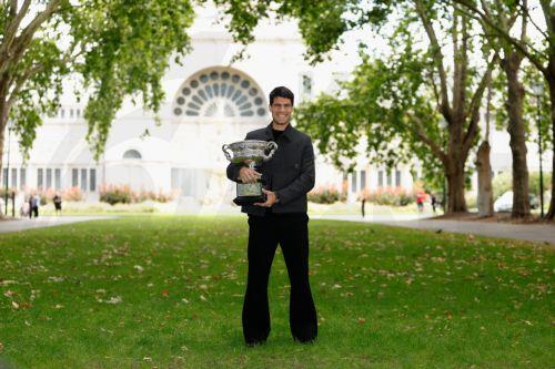 epa12699233 Carlos Alcaraz poses for a photograph after winning the AO 2026 men’s singles final against Novak Djokovic at the Royal Exhibition Building in Melbourne, Australia, 02 February 2026.  EPA/ROB PREZIOSO AUSTRALIA AND NEW ZEALAND OUT