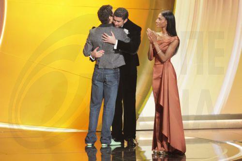 epa12699572 Puerto Rican rapper Bad Bunny (C) accepts the award for Album of the Year from English singer-songwriter and actor Harry Styles (L) onstage during the 68th annual Grammy Awards ceremony at Crypto.com Arena in Los Angeles, California, USA, 01 February 2026.  EPA/CHRIS TORRES