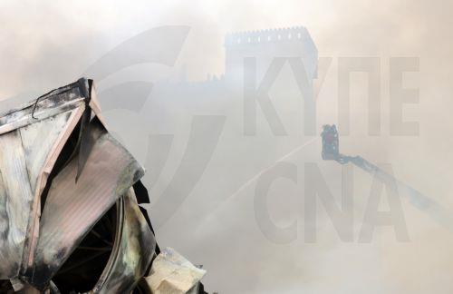 epa12701680 Firefighters try to control the fire at the Jannat shopping market in western Tehran, Iran, 03 February 2026. The cause of the fire is unclear.  EPA/ABEDIN TAHERKENAREH