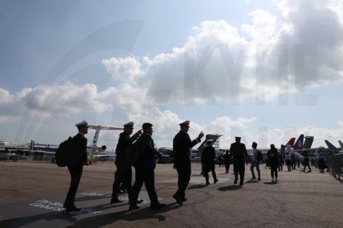 epa12701932 Visitors walk past a Republic of Singapore Air Force (RSAF) Orbiter 4 Close-Range Unmanned Aerial Vehicle (CR-UAV) on static display during the Singapore Airshow at Changi Exhibition Centre, Singapore, 03 February 2026. The Singapore Airshow 2026, one of Asia’s largest aerospace and defense exhibitions, runs from 03 to 08 February.  EPA/HOW HWEE...
