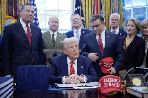 epa12703464 US President Donald Trump (C) participates alongside House Speaker Mike Johnson (C-R) in a bill signing ceremony in the Oval Office of the White House in Washington, DC, USA, 03 February 2026. The bill passed by the House of Representatives restores funding for several major federal departments, ending the partial government shutdown that began...