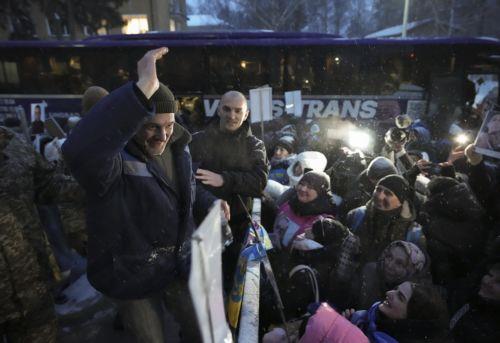 epa12706960 Relatives and friends welcome Ukrainian prisoners of war (POWs) following a prisoner swap at an undisclosed location in Ukraine, 05 February 2026. Ukraine announced the exchange 157 prisoners of war each with Russia. The 157 Ukrainians, soldiers of the Armed Forces, National Guard, State Border Service, and also civilians, were returned from...