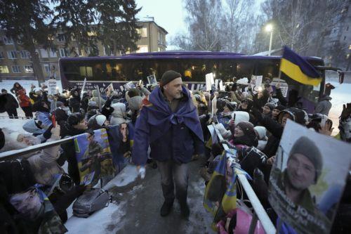 epa12706961 Relatives and friends welcome Ukrainian prisoners of war (POWs) following a prisoner swap at an undisclosed location in Ukraine, 05 February 2026. Ukraine announced the exchange 157 prisoners of war each with Russia. The 157 Ukrainians, soldiers of the Armed Forces, National Guard, State Border Service, and also civilians, were returned from...