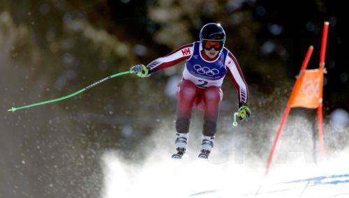 epa12711816 James Crawford of Canada competes in the Men's Downhill of the Alpine Skiing competition, at the Milano Cortina 2026 Winter Olympic Games, Stelvio ski centre in Bormio, Italy, 07 February 2026.  EPA/GUILLAUME HORCAJUELO