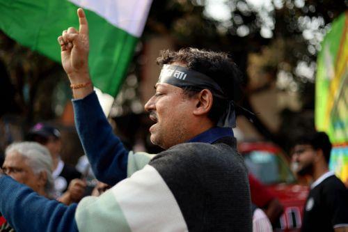 epa12719650 A man attends a protest campaign against violence and rape targeting women in Kolkata, India, 09 February 2026. A trainee doctor was found dead on 09 August 2024 in a seminar room of the RG Kar Medical College in Kolkata, sparking nationwide protests and strikes by medical students and doctors. In January 2025, the main suspect was sentenced to...