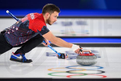 epa12719739 Korey Dropkin of the United States competes in the Mixed Doubles match between USA and Italy of the Curling competition, at the Milano Cortina 2026 Winter Olympic Games in Cortina d'Ampezzo, Italy, 09 February 2026.  EPA/JURE MAKOVEC