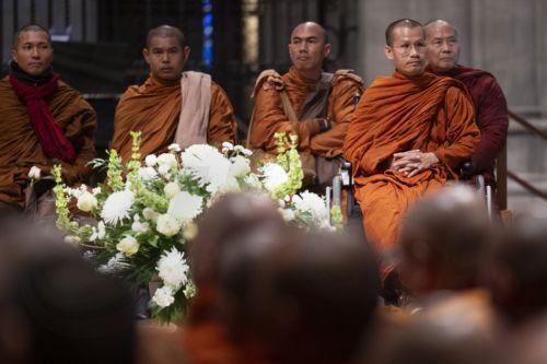 epa12725425 Maha Ajarn Dam Phommasan, a Theravada Buddhist monk who lost his leg during the Walk for Peace south of Houston, Texas, rejoins the group at the Washington National Cathedral during the Walk for Peace in Washington, DC, USA, 10 February 2026. The Theravada Buddhist monks, who have walked from  Fort Worth, Texas, will make stops at the National...