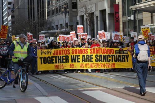epa12732996 San Francisco Police block an intersection as San San Francisco teachers, educators and supporters rally and march as the teachers' strike enters its fourth day in San Francisco, California, USA, 12 February 2026. The San Francisco Unified School District (SFUSD) and union representatives continue negotiating a new contract as schools remain...