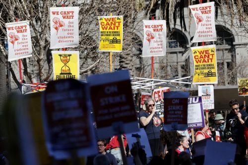 epa12733000 San Francisco teachers, educators and supporters rally and march as the teachers' strike enters its fourth day in San Francisco, California, USA, 12 February 2026. The San Francisco Unified School District (SFUSD) and union representatives continue negotiating a new contract as schools remain closed. The last San Francisco teachers' strike was...