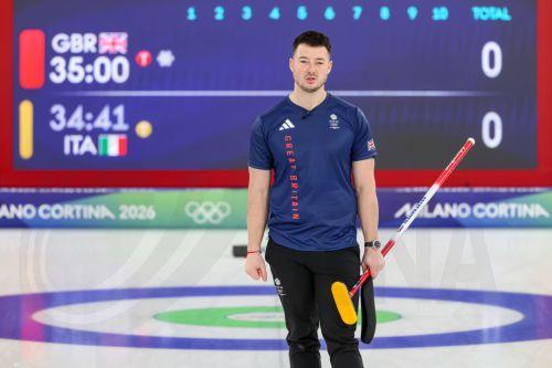 epa12733406 Hammy McMillan of Great Britain competes in the Men's Curling match Italy against Great Britain at the Milano Cortina 2026 Winter Olympic Games, in Cortina, Italy, 13 February 2026.  EPA/ANDREA SOLERO