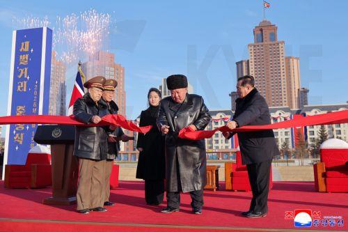 epa12745279 A photo released by the official Korean Central News Agency (KCNA) shows North Korean leader Kim Jong Un (C) and his daughter, Kim Ju Ae (center L), attending the opening ceremony of Saeppyol Street, a new housing district dedicated to the families of fallen soldiers in the Hawasong area of Pyongyang, North Korea, on 15 February 2026 (issued 16...