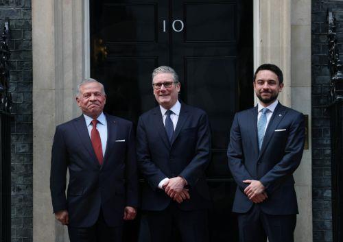 epa12747213 British Prime Minister Keir Starmer (C) welcomes Jordan's King Abdullah II (L) and Crown Prince Hussein (R) to the Prime Minister's Office at 10 Downing Street in London, Britain, 16 February 2026.  EPA/ANDY RAIN