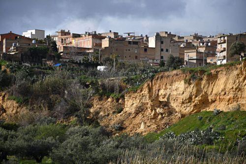 epa12747336 A section of land that collapsed during a landslide in the town of Niscemi, Sicily, Italy, 16 February 2026. Niscemi has been devastated by a major landslide that occurred in late January 2026, triggered by Storm Harry that swept across Sicily and southern Italy.  EPA/ORIETTA SCARDINO
