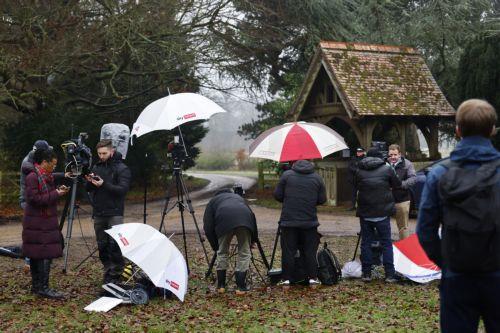 epa12758007 Members of the media wait outside Wood Farm where Andrew Mountbatten-Windsor (formerly  Prince Andrew, the Duke of York) was arrested in Sandringham, Norfolk, Britain, 19 February 2026. Mountbatten-Windsor was arrested on the morning of the 19 February by Thames Valley Police who stated the arrest was made 'on suspicion of misconduct in public...
