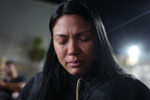 epa12760484 A woman reacts upon learning of the approval of the amnesty law for political prisoners in front of the Bolivarian National Police (PNB) headquarters known as Zone 7, in Caracas, Venezuela, 19 February 2026. Relatives of Venezuela's political prisoners celebrated the approval of the amnesty law, which pardons cases from 2002 to 2025. They...