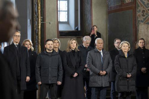 epa12773059 A handout photo made available by the Presidential Press Service shows (L-R) Finnish President Alexander Stubb, Ukrainian President Volodymyr Zelensky with his wife Olena Zelenska, EU Council President Antonio Costa, European Commission President Ursula von der Leyen, and other top EU officials attending the joint Prayer for Ukraine at St....