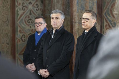 epa12773063 A handout photo made available by the Presidential Press Service shows Croatian Prime Minister Andrej Plenkovic (C), Finnish President Alexander Stubb (R), and other top EU officials attending a joint prayer for Ukraine at St. Sophia Cathedral in Kyiv, Ukraine, 24 February 2026. Top EU leaders arrived in Ukraine on the anniversary of the start...