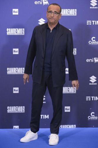 epa12773135 Sanremo Festival host and artistic director Carlo Conti poses during a photocall at the 76th edition of the Sanremo Italian Song Festival in Sanremo, Italy, 24 February 2026. The music festival will run from 24 to 28 February 2026.  EPA/RICCARDO ANTIMIANI