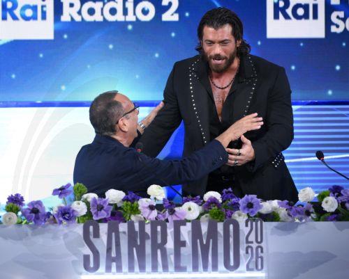 epa12773169 Sanremo Festival host and artistic director Carlo Conti (L) and Turkish actor Can Yaman (R) attend a press conference at the 76th Sanremo Italian Song Festival in Sanremo, Italy, 24 February 2026. The 2026 Music Festival runs from 24 to 28 February 2026.  EPA/ETTORE FERRARI