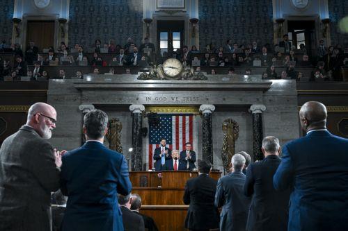 epa12775421 President Donald Trump delivers the first State of the Union address of his second term to a joint session of Congress in the House Chamber of the United States Capitol in Washington, D.C., on Tuesday, February 24, 2026. Seated behind him are Vice President JD Vance and Speaker of the House Mike Johnson (R-LA).  EPA/KENNY HOLSTON / POOL