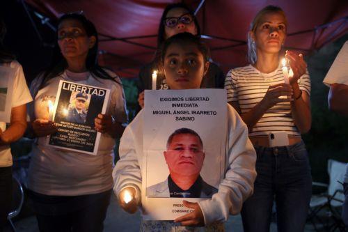 epaselect epa12780563 Relatives of political prisoners hold candles and posters during a vigil in Zamora, Venezuela, 26 February 2026. The amnesty program in Venezuela marked one week since its enactment by acting president Delcy Rodríguez, with 217 prisoners released during that period. According to independent records, more than 500 political prisoners...