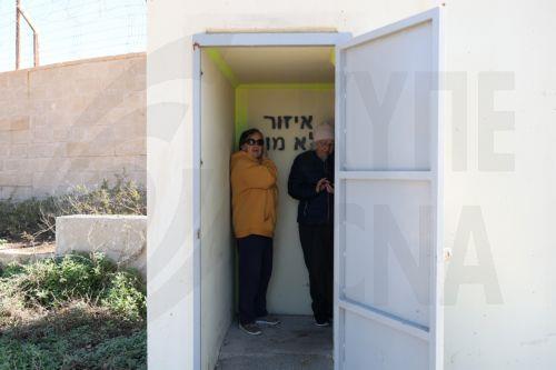 epa12783048 People take cover in a bomb shelter after a security alert, in the mediterranean city of Haifa, Israel, 28 February 2026. The Israeli military reported on 28 February it deteced missiles launched from Iran following earlier Israeli and US strikes. Sirens were activated across several parts of the country in response.  EPA/ATEF SAFADI