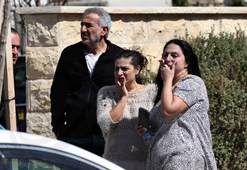 epa12783359 Israelis are evacuated from their building that got hit by a missile fired from Iran, in Tirat Hacarmel near Haifa, Israel, 28 February 2026. The Israeli military reported on 28 February it deteced missiles launched from Iran following earlier Israeli and US strikes. Sirens were activated across several parts of the country in response. ...