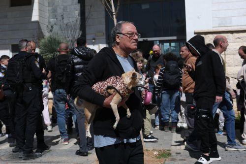 epa12783362 Israelis are evacuated from their building that got hit by a missile fired from Iran, in Tirat Hacarmel near Haifa, Israel, 28 February 2026. The Israeli military reported on 28 February it deteced missiles launched from Iran following earlier Israeli and US strikes. Sirens were activated across several parts of the country in response. ...