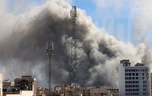 epa12786538 Smoke rises in central Tehran after an Israeli attack in Iran, 01 March 2026. A joint Israeli and US military operation continues on its second day after targeting multiple locations across Iran in the early hours of 28 February 2026, with Iran later launching retaliatory attacks.  EPA/ABEDIN TAHERKENAREH