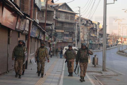epa12788721 Indian paramilitary personnel patrol near the sealed city centre at Lal Chowk during restrictions in Srinagar, Kashmir, India, 02 March 2026. The authorities imposed severe restrictions a day after Shia Muslim demonstrators staged massive protests and assembled in the city centre near the iconic clock tower in Srinagar, holding posters of...