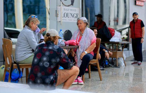 epa12789638 Passengers stranded by suspended air traffic from Austria, Swiss and Serbia wait in front of a hotel in Doha, Qatar, 02 March 2026. Following a joint Israel-US military operation targeting multiple locations across Iran in the early hours of 28 February 2026 and Iran's retaliatory attacks across the region, several countries closed their...