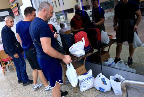 epa12789641 Passengers stranded by suspended air traffic from Serbia enter a hotel in Doha, Qatar, 02 March 2026. Following a joint Israel-US military operation targeting multiple locations across Iran in the early hours of 28 February 2026 and Iran's retaliatory attacks across the region, several countries closed their airspace and airlines cancelled...
