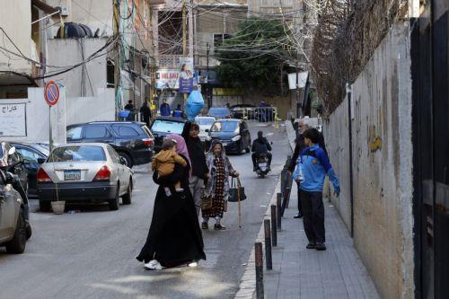 epa12805921 People carry their belongings after fleeing their homes following Israeli airstrikes in Beirut, Lebanon, 09 March 2026. The Israeli military stated it is conducting strikes across the country targeting Hezbollah infrastructure and personnel. According to the Disaster Management Unit of the Lebanese government, as of 08 March 2026, more than...