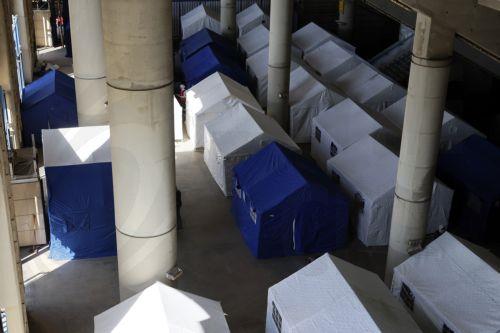 epa12811741 A view of tents for displaced people inside the Camille Chamoun Sports City Stadium in Beirut, Lebanon, 11 March 2026. Lebanese authorities report more than 759,000 registered displaced since the escalation began on 02 March 2026, though the true number is likely higher as many stay with relatives or rent in safer areas.  EPA/WAEL HAMZEH